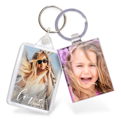 Two keyrings showing women with baby bump and mother and child